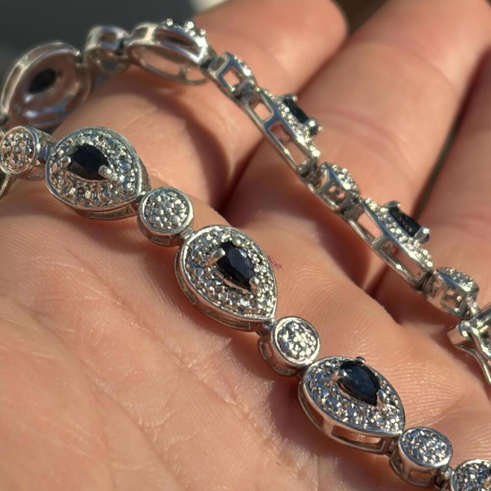 Sterling sapphire tear drop shaped tennis bracelet